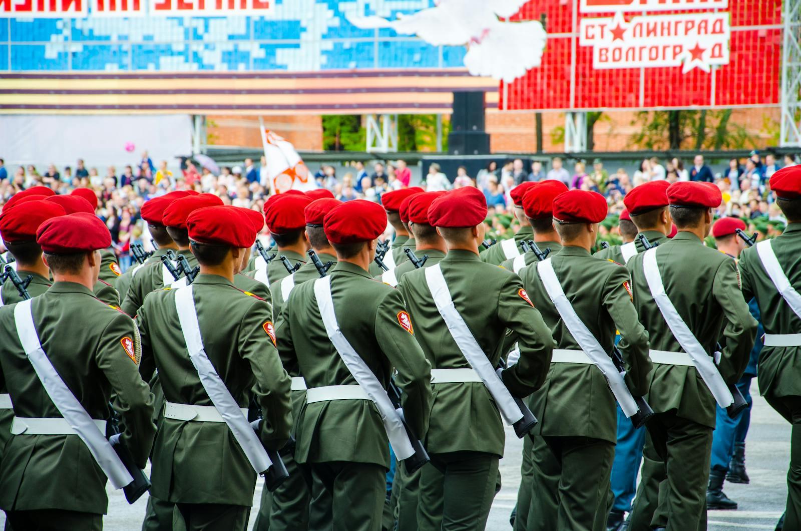 Russian Military Police on parade with Volgograd backdrop in Cyrillic.