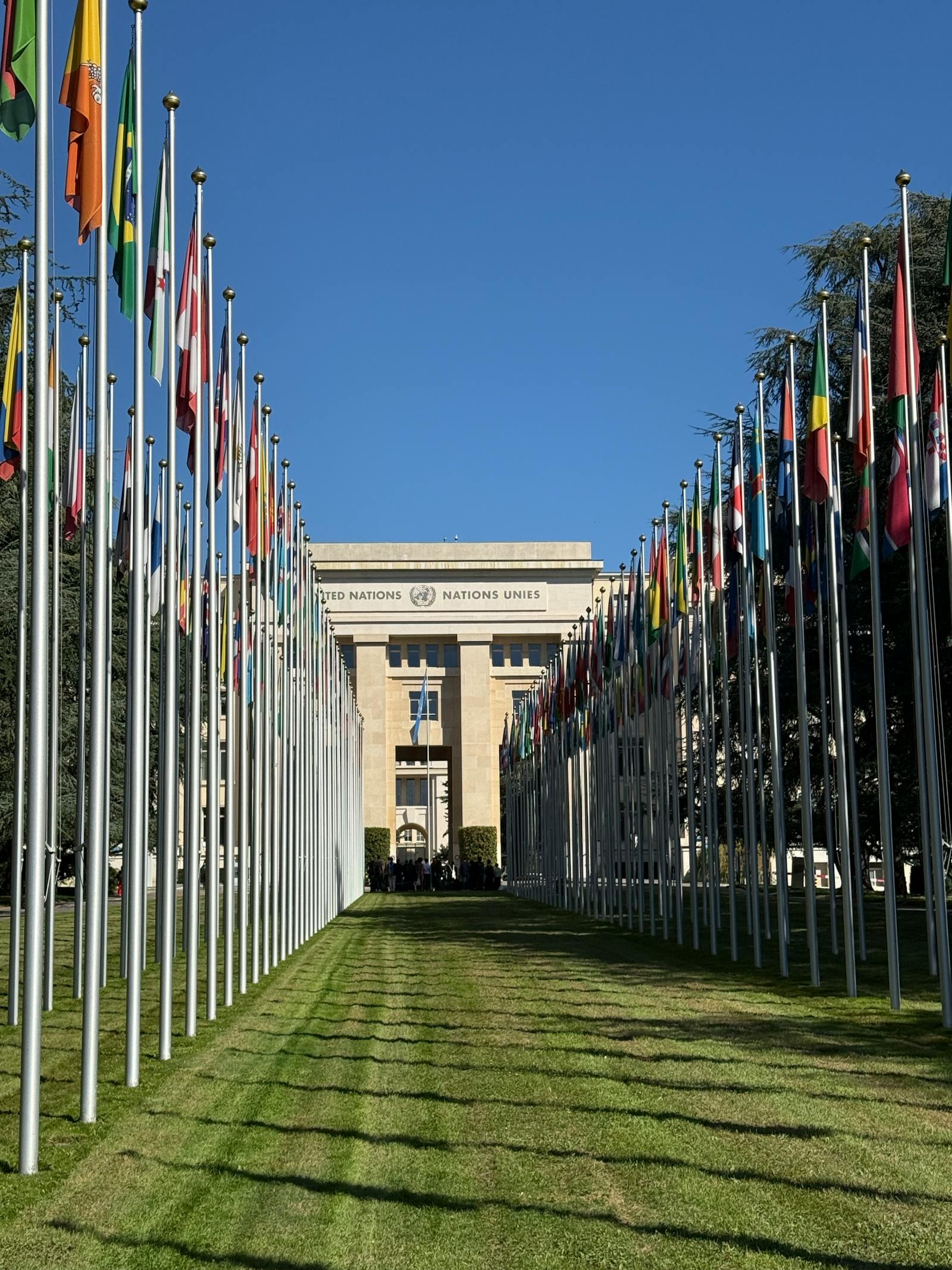 Avenue of national flags leading to the Palais des Nations, the UN office in Geneva.